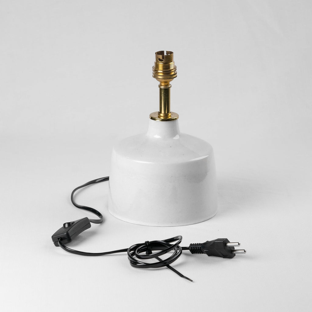 Artisan blue pottery lamp base with floral motifs for interior decoration