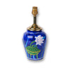 Artisan blue pottery lamp base with floral motifs for interior decoration